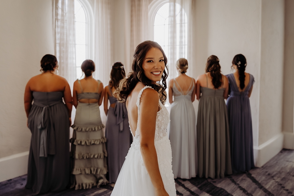 first look with bridesmaids at the don cesar taken by tampa wedding photographer