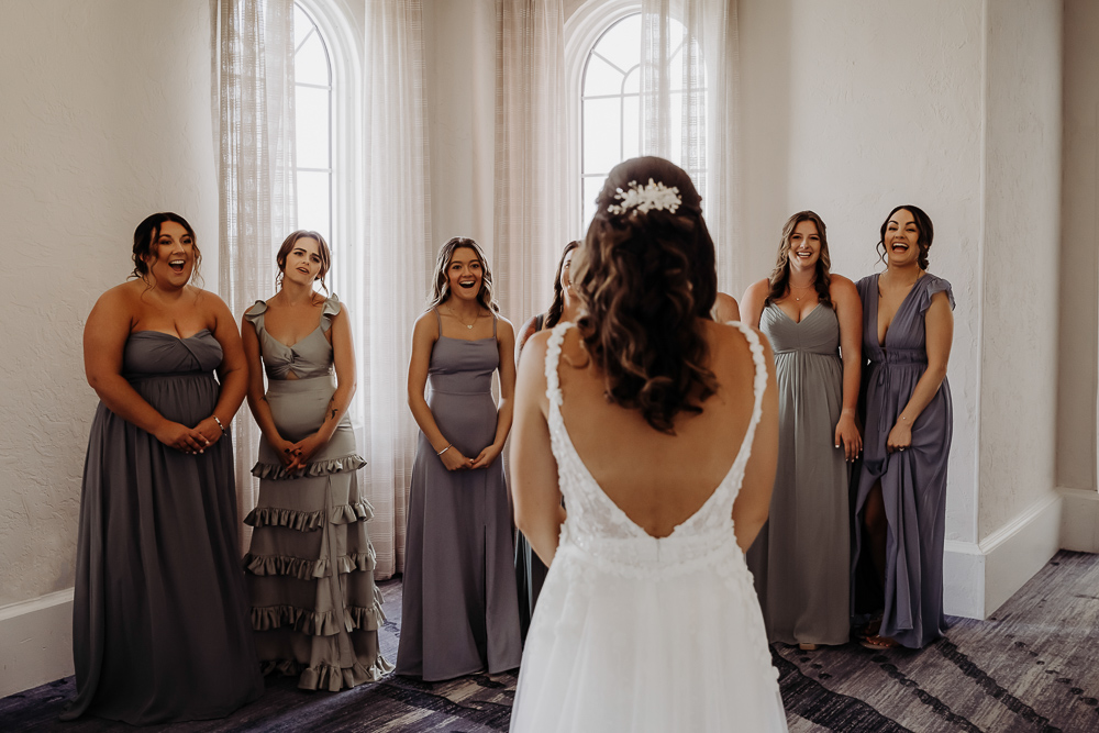 first look with bridesmaids at the don cesar taken by tampa wedding photographer