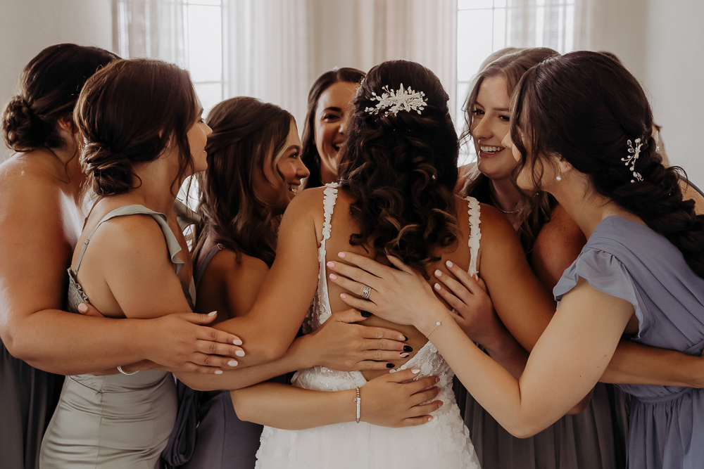 first look with bridesmaids at the don cesar taken by tampa wedding photographer