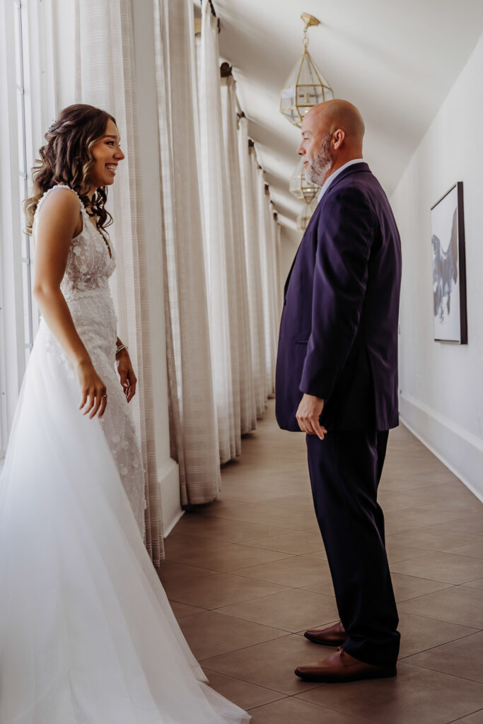 first look with father for don cesar wedding by tampa wedding photographer