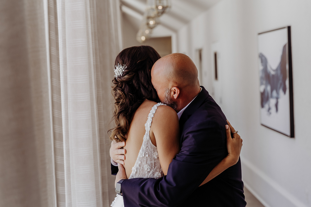 first look with father for don cesar wedding by tampa wedding photographer