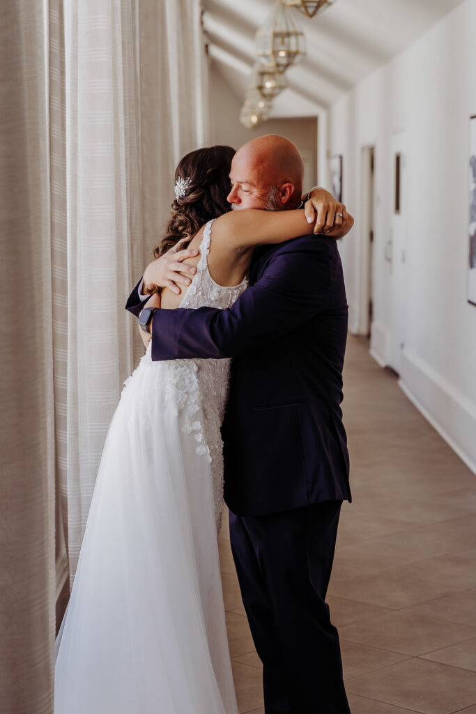 first look with father for don cesar wedding by tampa wedding photographer