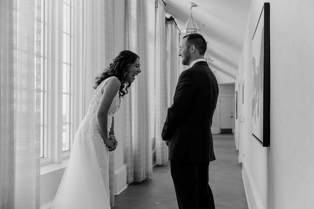 bride and grooms first look on their wedding day at the don cesar by tampa wedding photographer