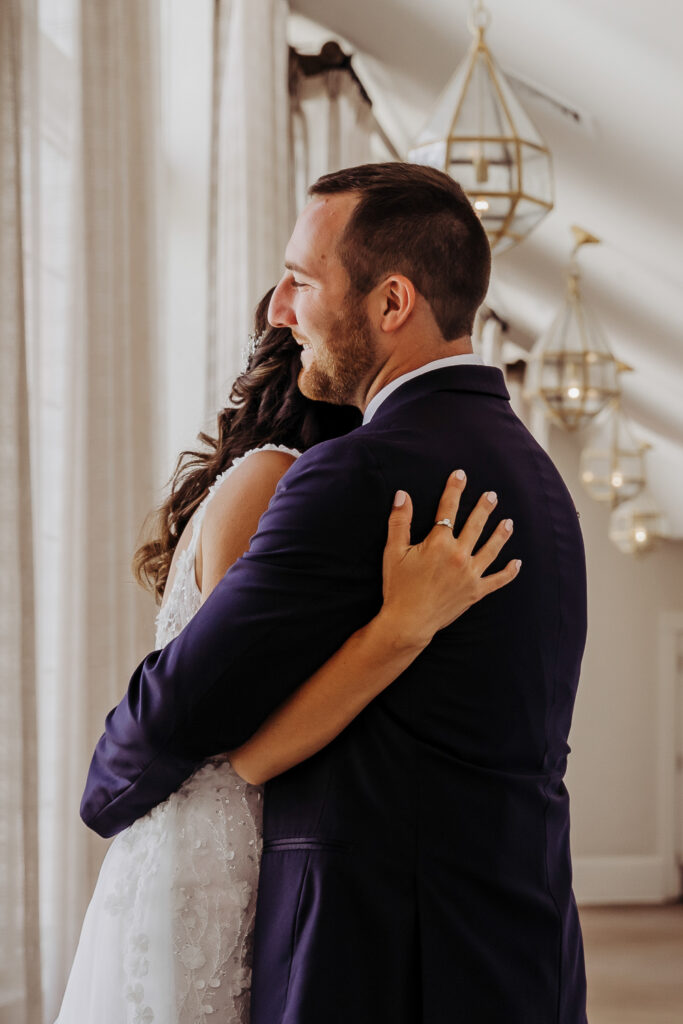 bride and grooms first look on their wedding day at the don cesar by tampa wedding photographer