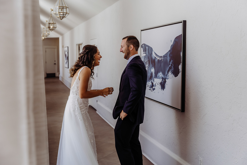 bride and grooms first look on their wedding day at the don cesar by tampa wedding photographer