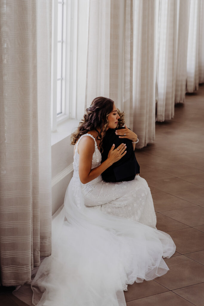 brides first look with her son on her wedding day with a tampa wedding photographer