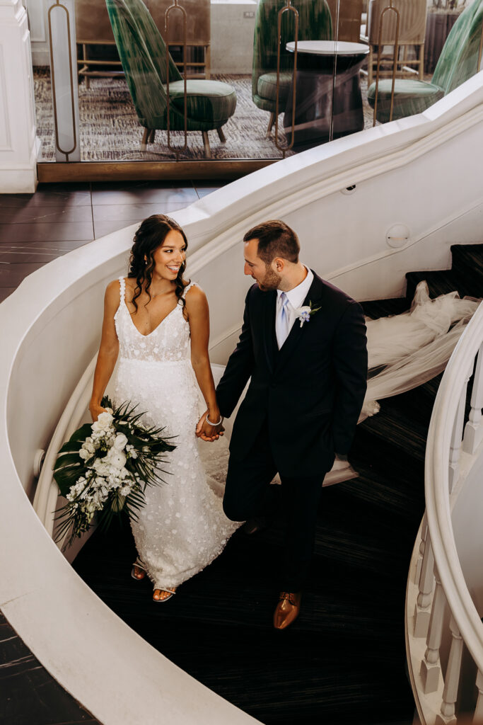 bride and groom portraits on their don cesar wedding day in st pete florida