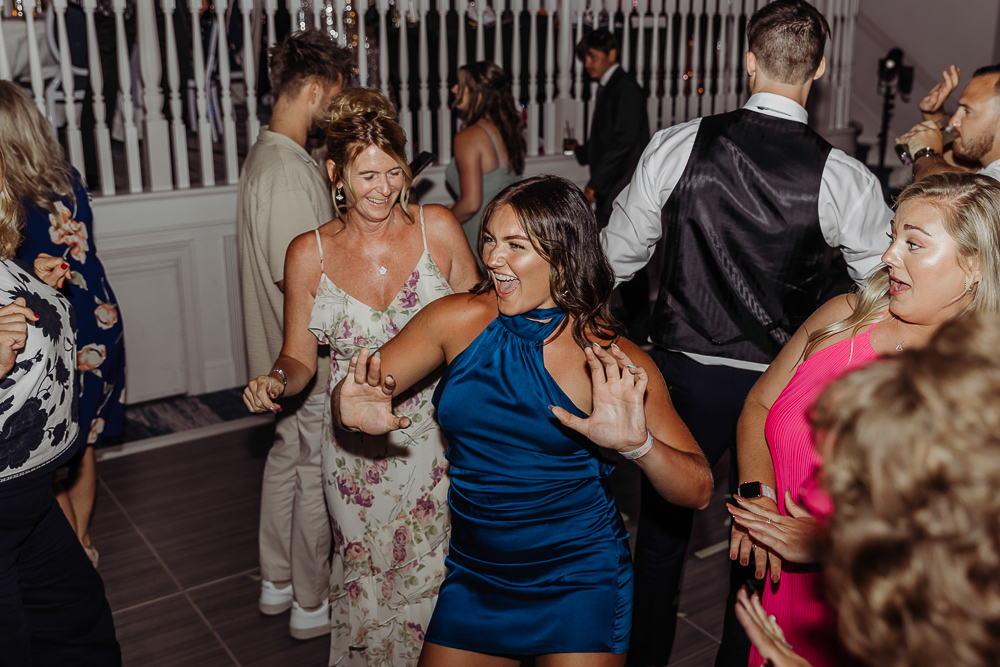 reception photo of woman dancing 