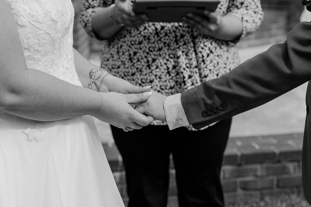 eloping couple at plant park tampa holding hands during their florida elopement