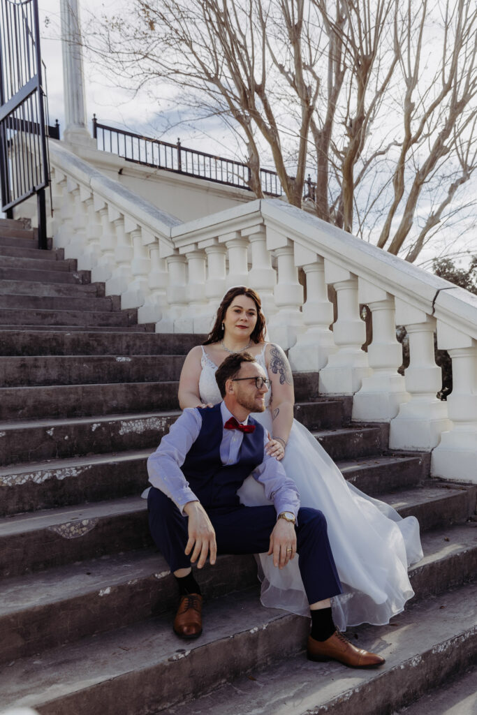 portrait of couple on stairs in downtown tampa for their florida elopement 