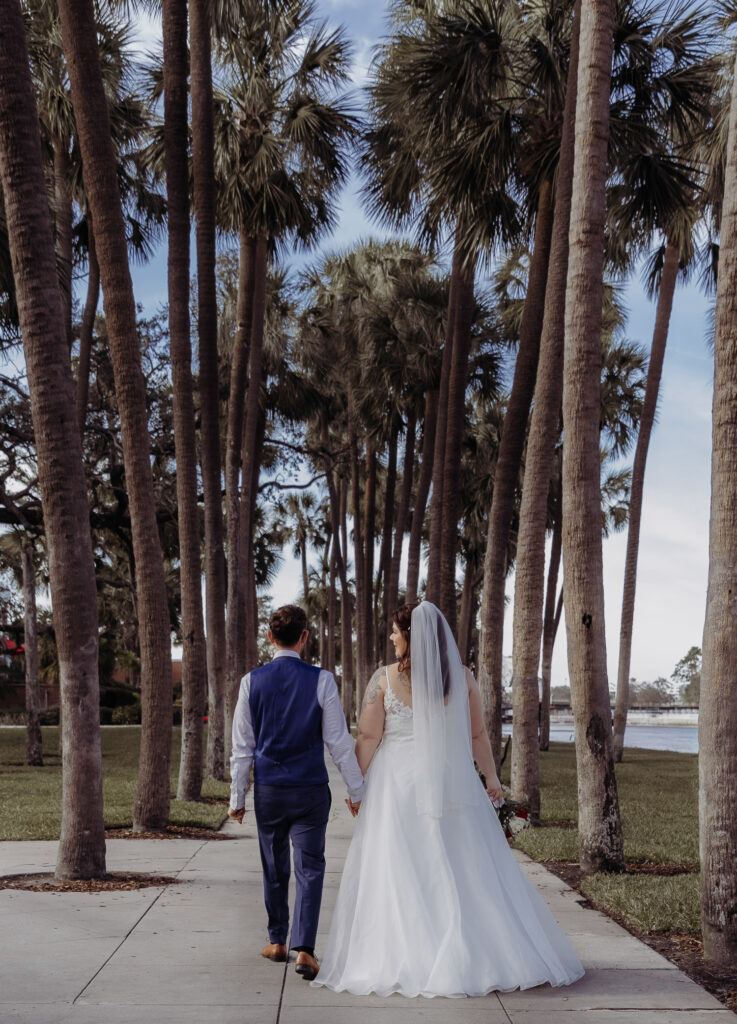 portrait with palm trees after a downtown tampa florida elopement 