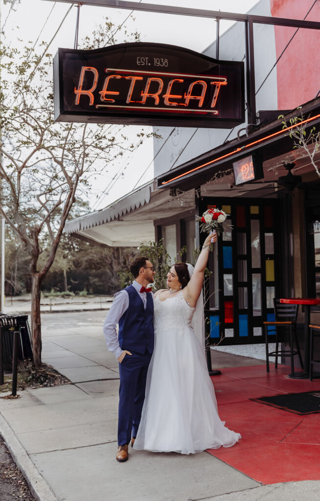 couple celebrating their elopement at the place they had their first date at 