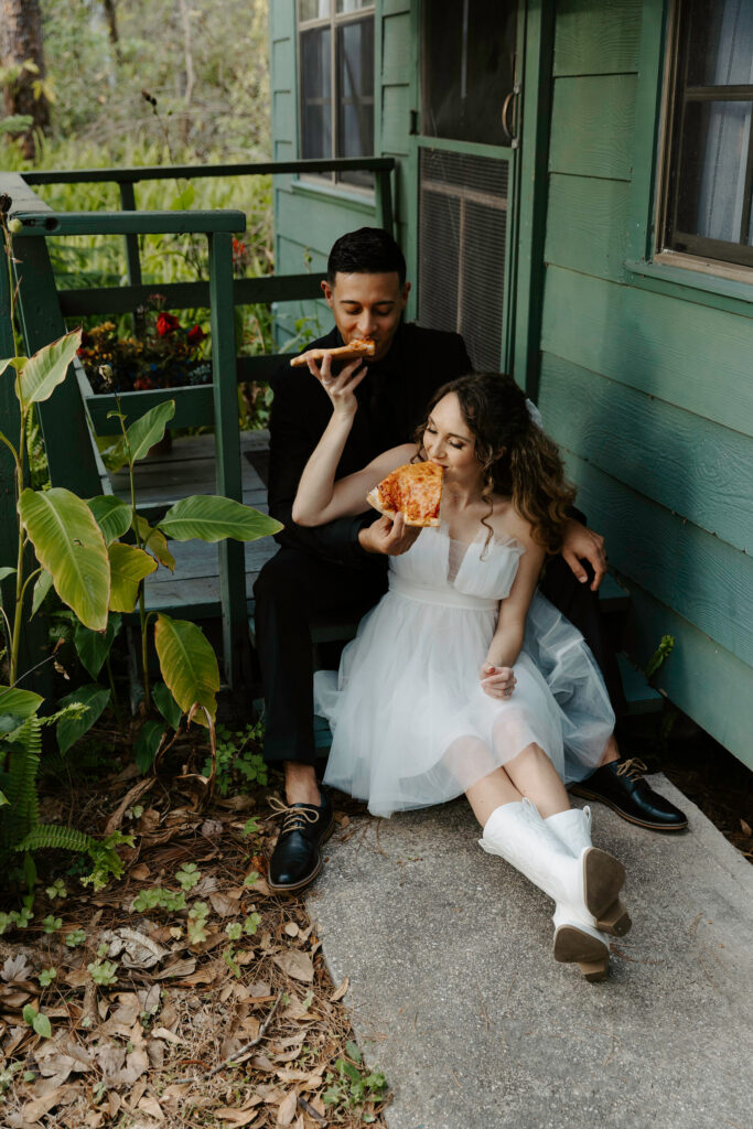 couple who eloped eating pizza to celebrate in tampa