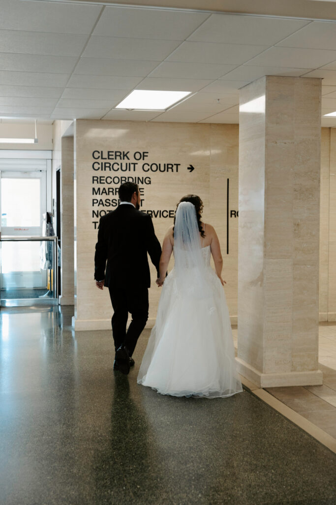 couple during their courthouse elopement in tampa 