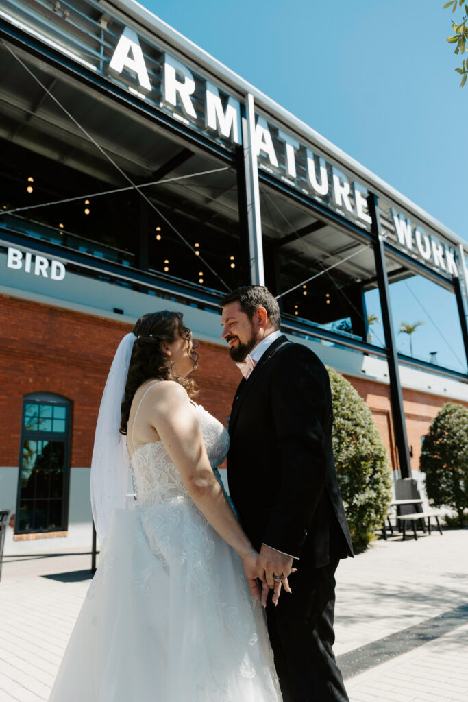 couple having lunch at armature works in downtown tampa after their elopement 