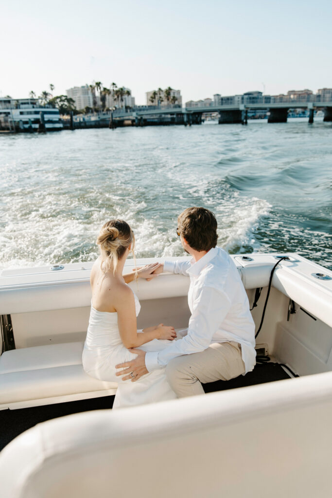couple on a boat celebrating their courthouse elopement
