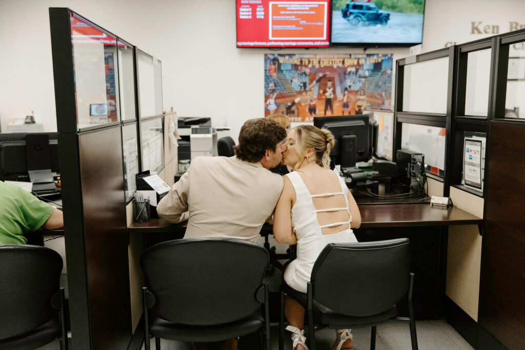 couple sharing a kiss during their courthouse elopement in tampa 