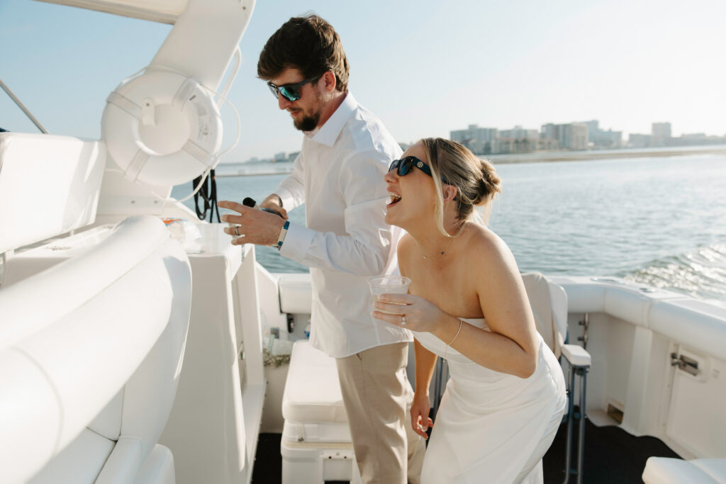 boat celebrating after their courthouse elopement in tampa 