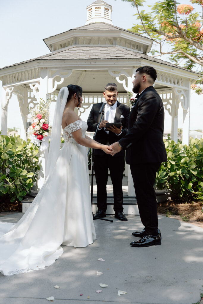 couple having their intimate wedding in tampa at davis island garden club