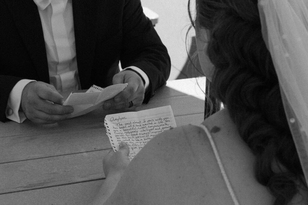 couple celebrating their elopement in tampa on the riverwalk