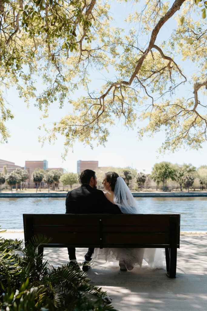 couple celebrating their elopement in tampa on the riverwalk