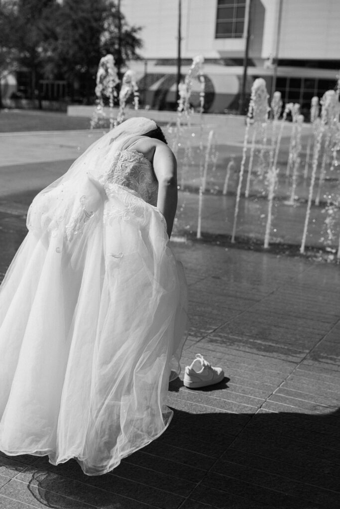 couple celebrating their elopement in tampa on the riverwalk