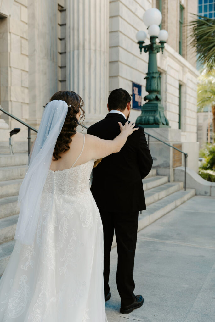 couple doing a first look before their elopement in tampa downtown