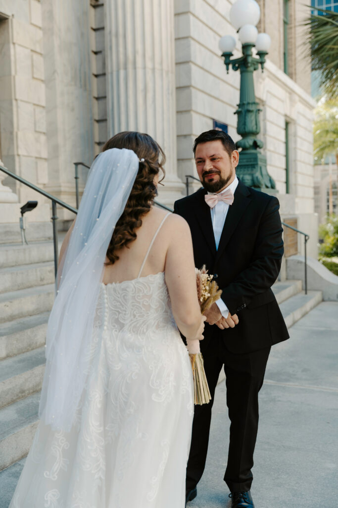 couple doing a first look before their elopement in tampa downtown