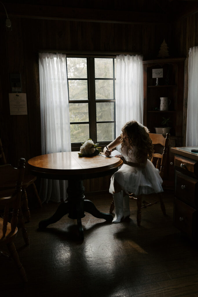 bride writing her vows before her elopement in florida