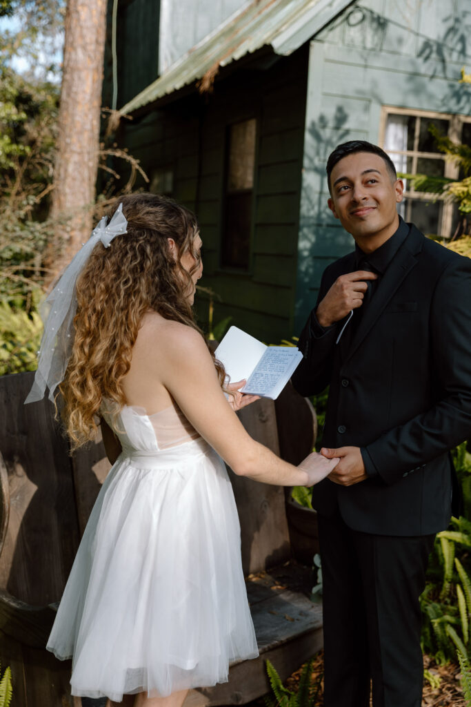 couple reading their personal vows before their tampa elopement
