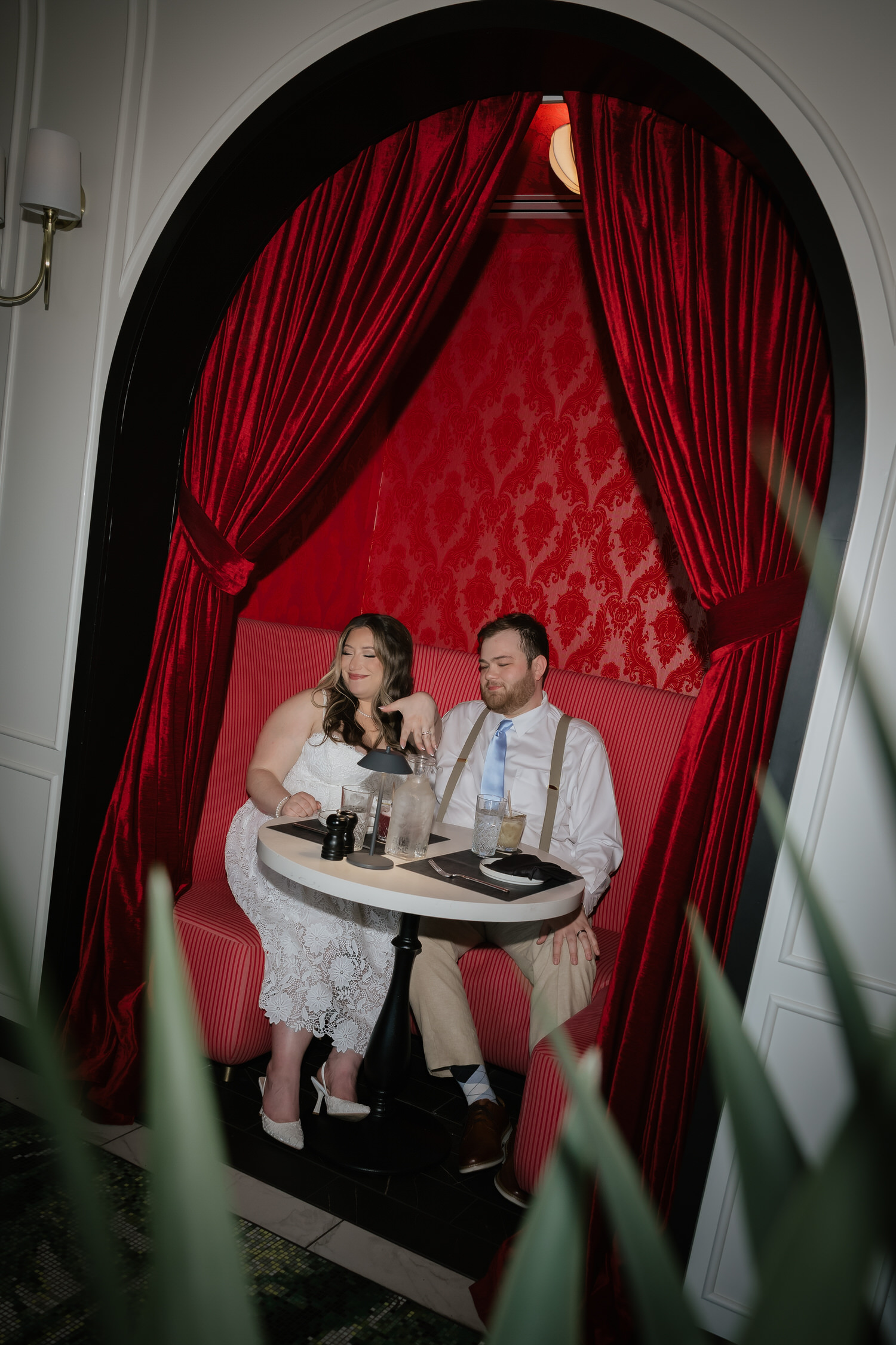 couple at ringside restaurant celebrating after getting married at the historic sarasota courthouse wedding