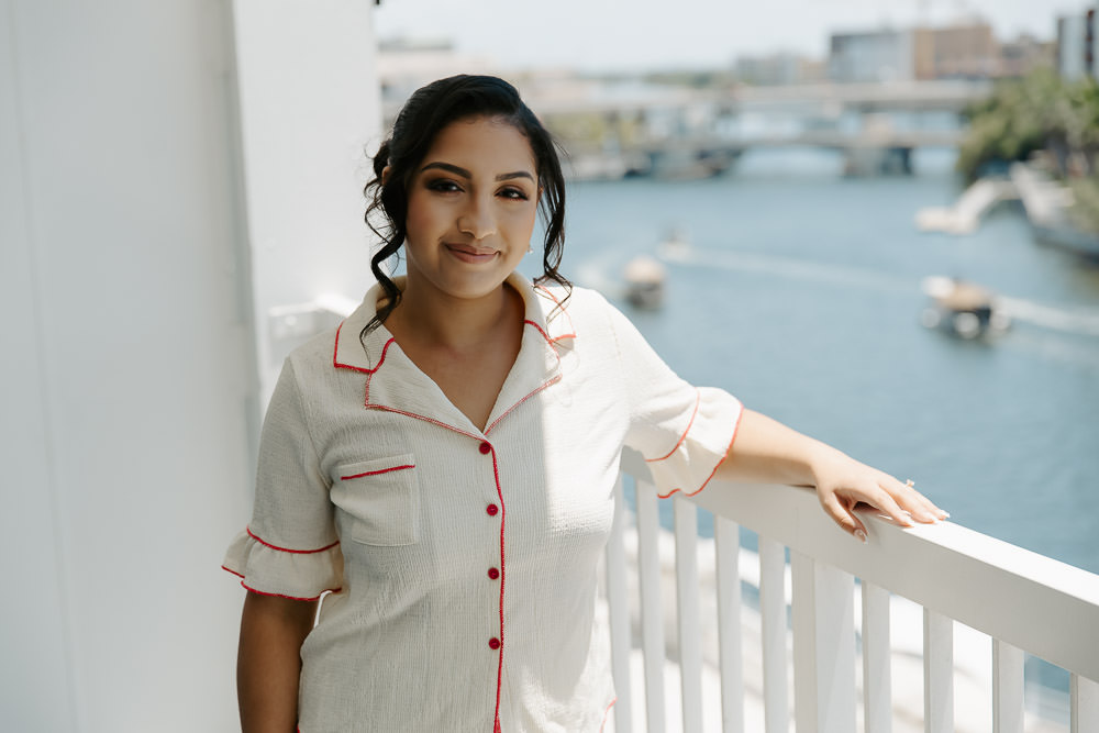 portrait of the bride in her getting ready pjs at hotel tampa riverwalk