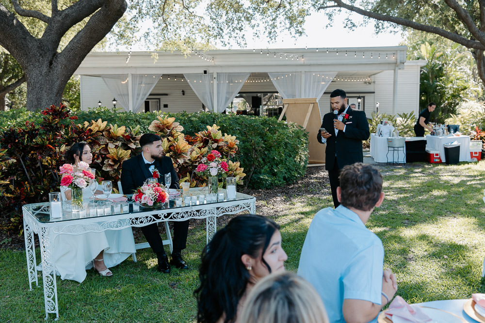 the best man giving his speech during a davis island garden club wedding 