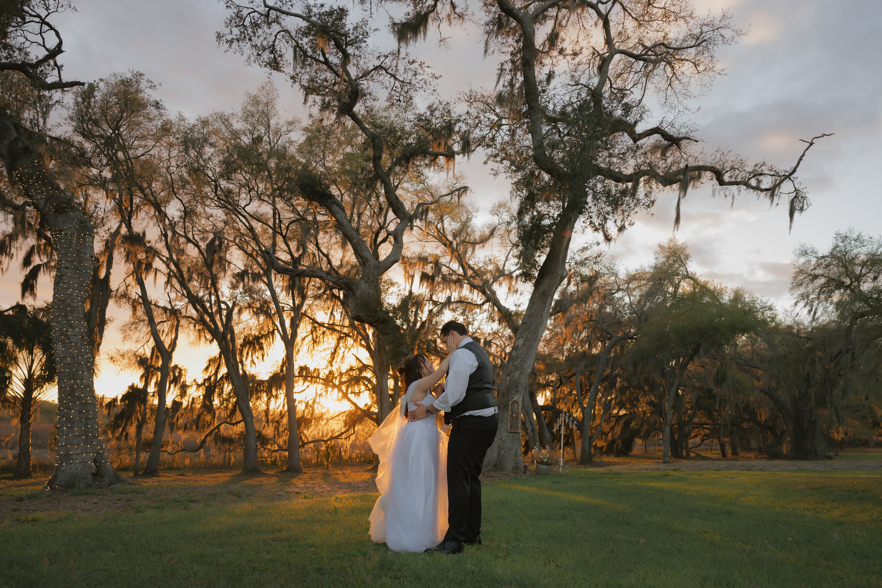 a couple dancing at sunset at flora groves farm in tampa, florida